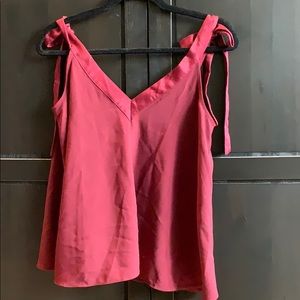 Red tank top blouse.